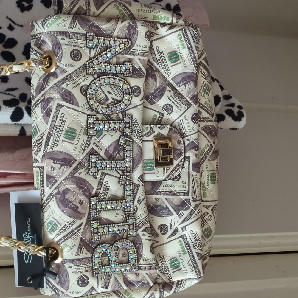 Cream Shoulder Bag with Eye-Catching Design